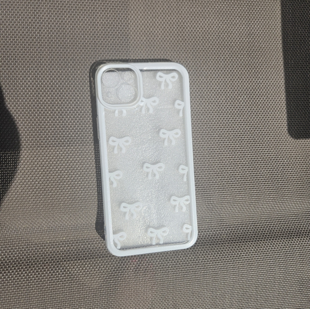 ** Free With Purchase** White Bow I Phone 14 plus Case
